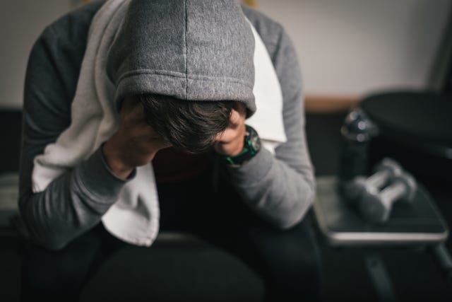 Arm, Human, Sitting, Hand, Joint, Headgear, Photography, Room, Glasses, Personal protective equipment, 