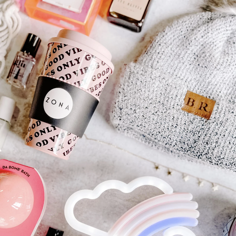 strong selfie best subscription boxes for teens, an array of products, including a hat and portable cup