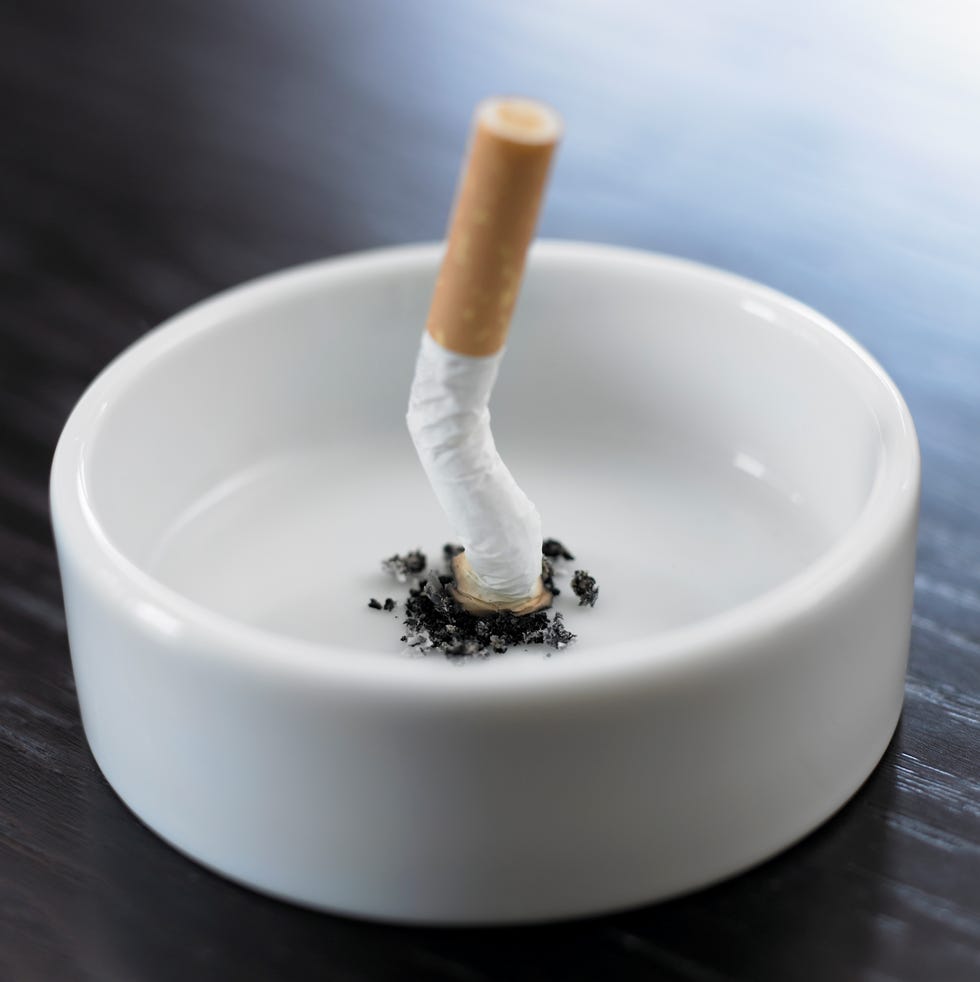 stubbed out cigarette in ashtray