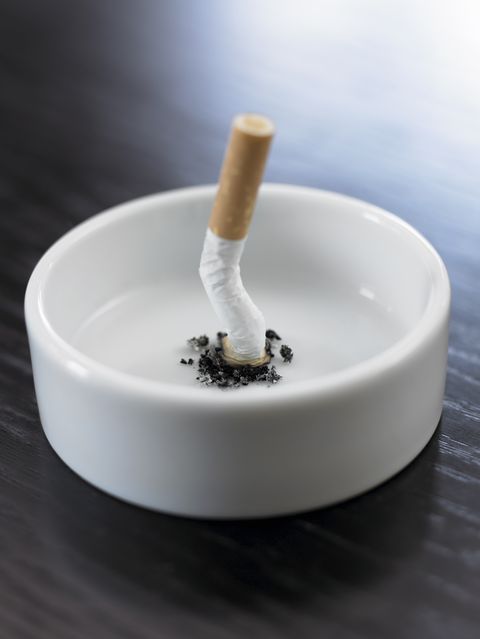stubbed out cigarette in ashtray