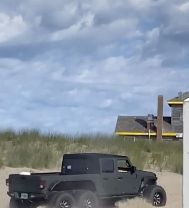 jeep gladiator 6x6 stuck on the beach in the hamptons
