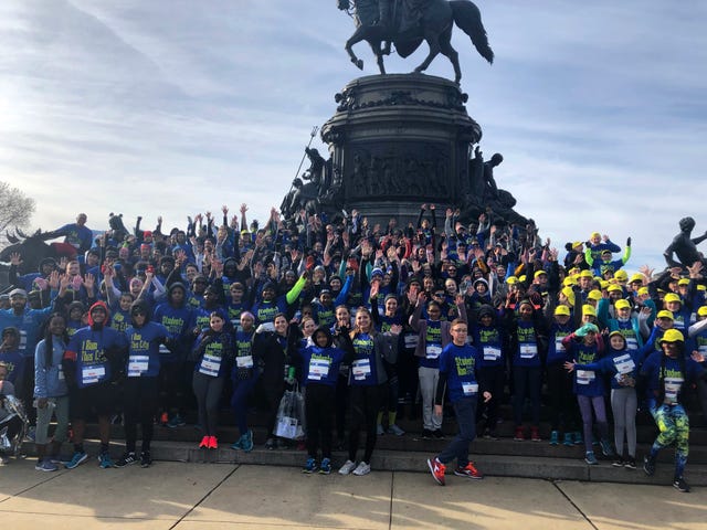 group photo of students run philly style