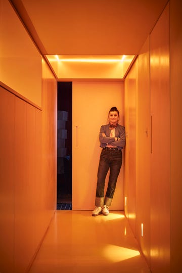 a person standing in a hallway