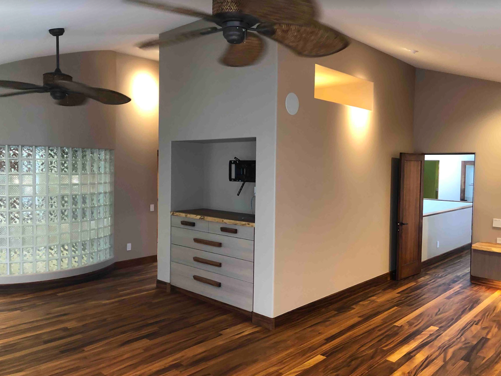 master bedroom before with dark floors and large closet