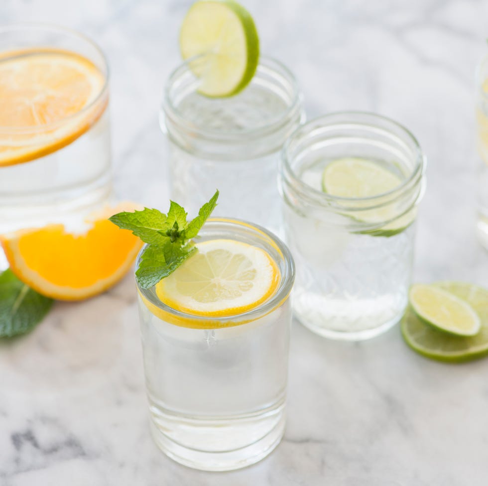 Studio shot of drinks with lemon, lime and orange studio shot of drinks with lemon, lime and orange