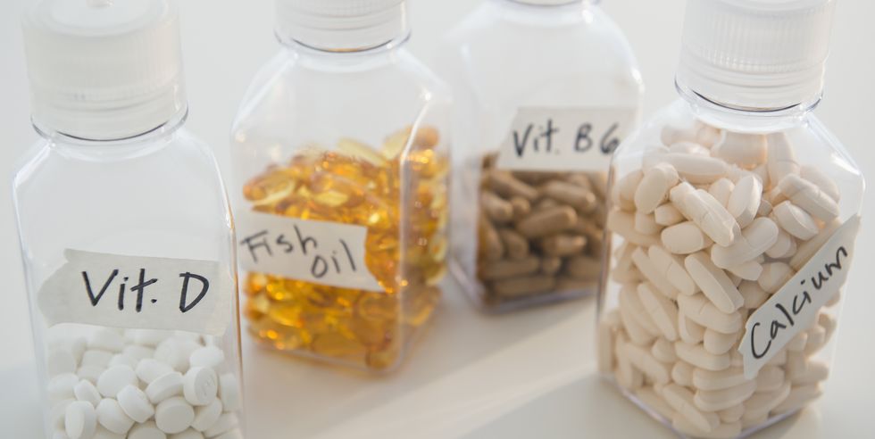 studio shot of various pills in bottles