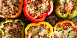 colorful stuffed peppers with ground beef and tomato rice