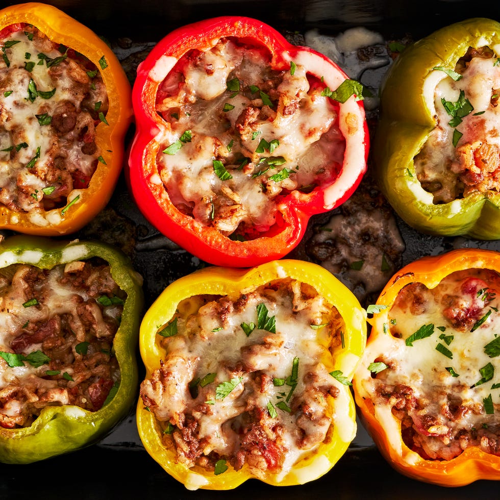 colorful stuffed peppers with ground beef and tomato rice