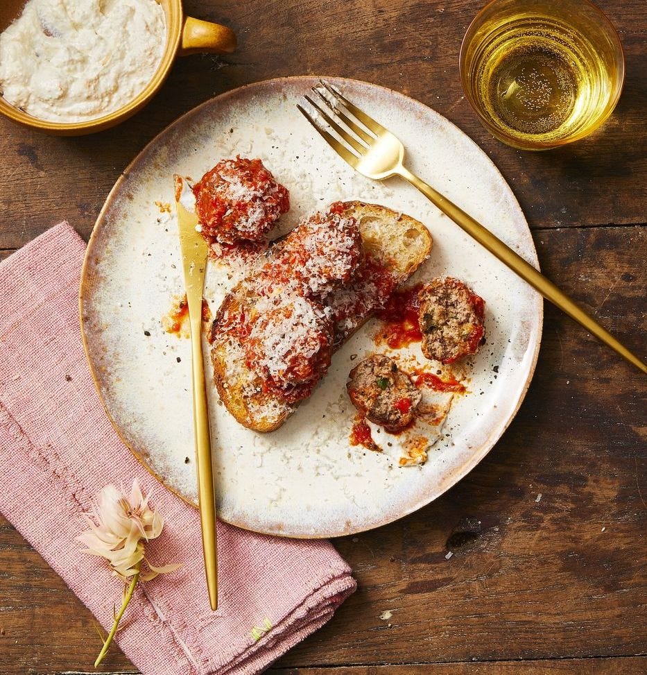 stuffing meatballs on a piece of toast