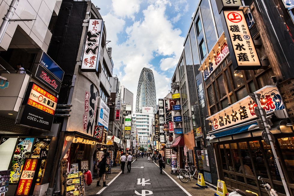 stunning view of the entertainment district at the foot of the skyscrapers of shinjuku in tokyo