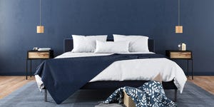 stylish bedroom interior in trendy blue
