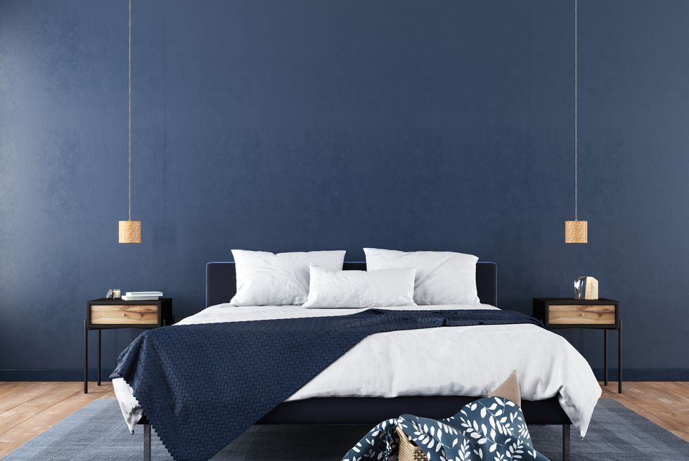 stylish bedroom interior in trendy blue