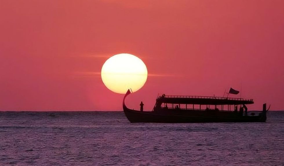 a sunset cruise at atmosphere kanufushi maldives