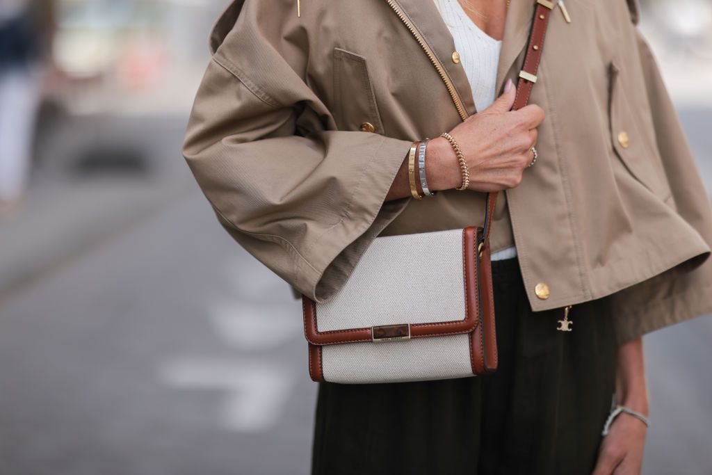 Sophie Turner spotted in a beige blazer, black leather mini-skirt