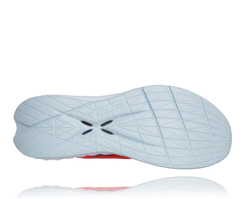 la suela de una zapatilla de running de hoka one one en color blanco