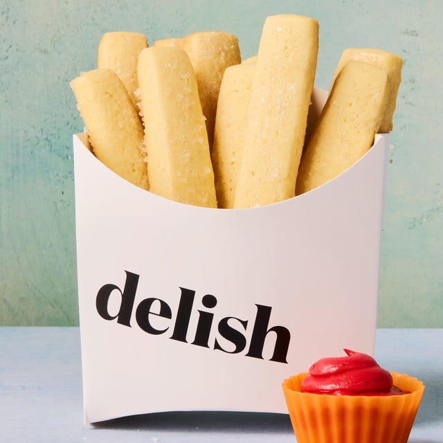 Sugar Cookie Fries sugar cookies shaped as fries in a container dipped in red icing