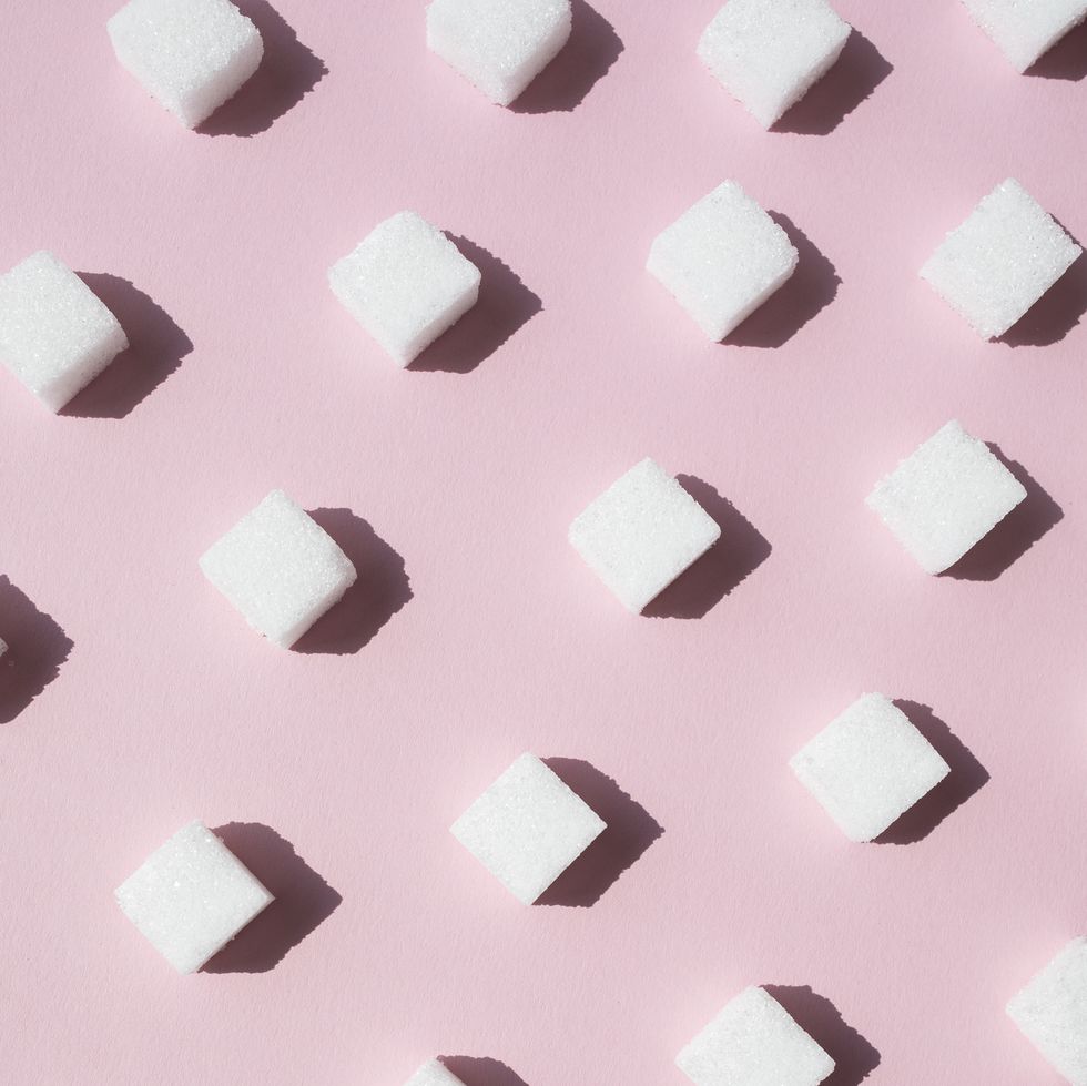 sugar cubes on pink background