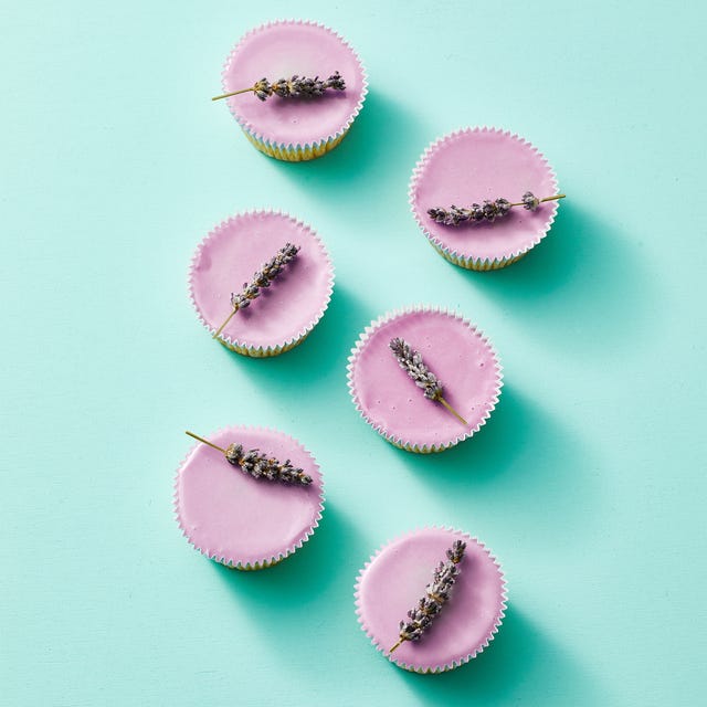 sugared lavender cupcakes on a turquoise background sugared lavender cupcakes on a turquoise background