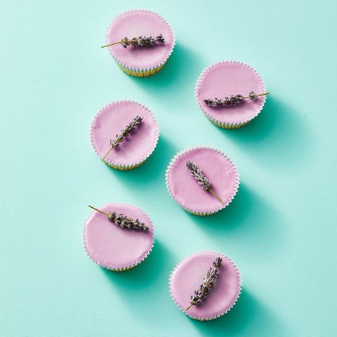 sugared lavender cupcakes on a turquoise background sugared lavender cupcakes on a turquoise background