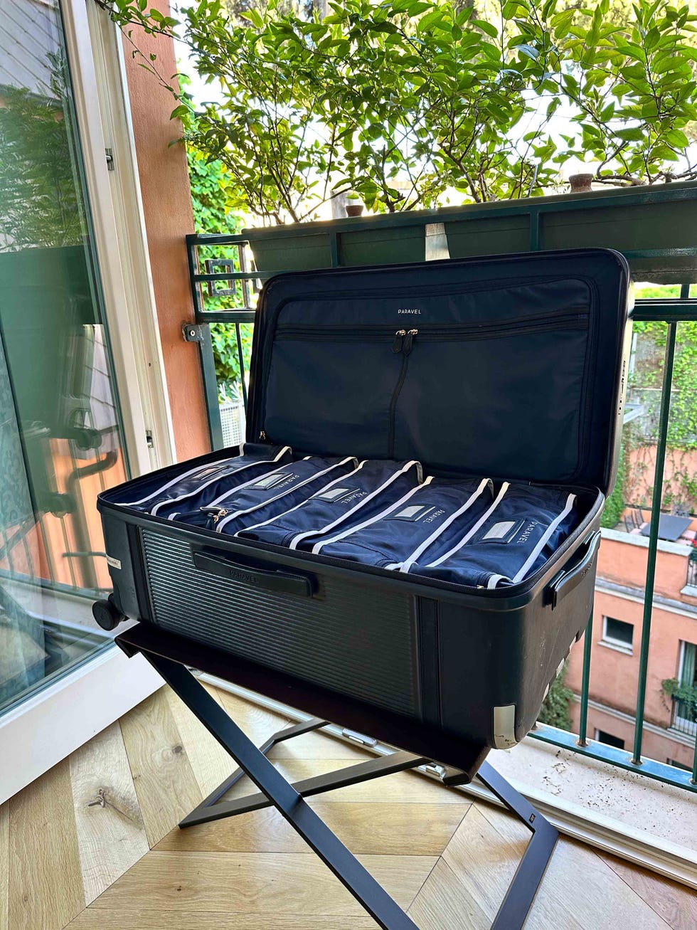 open suitcase with packing cubes
