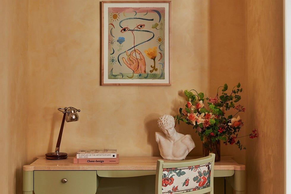 a stylish workspace with art and decorative elements