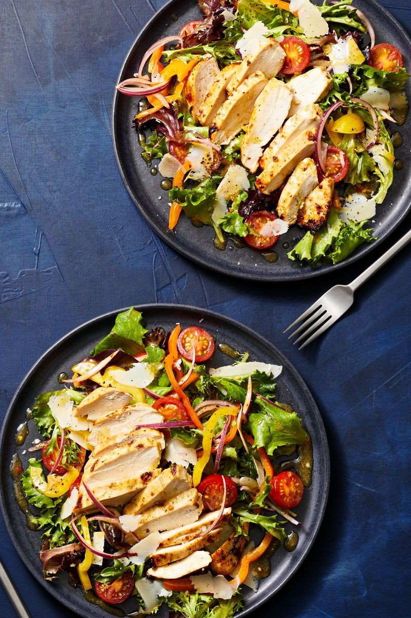 chicken with a mixed green salad
