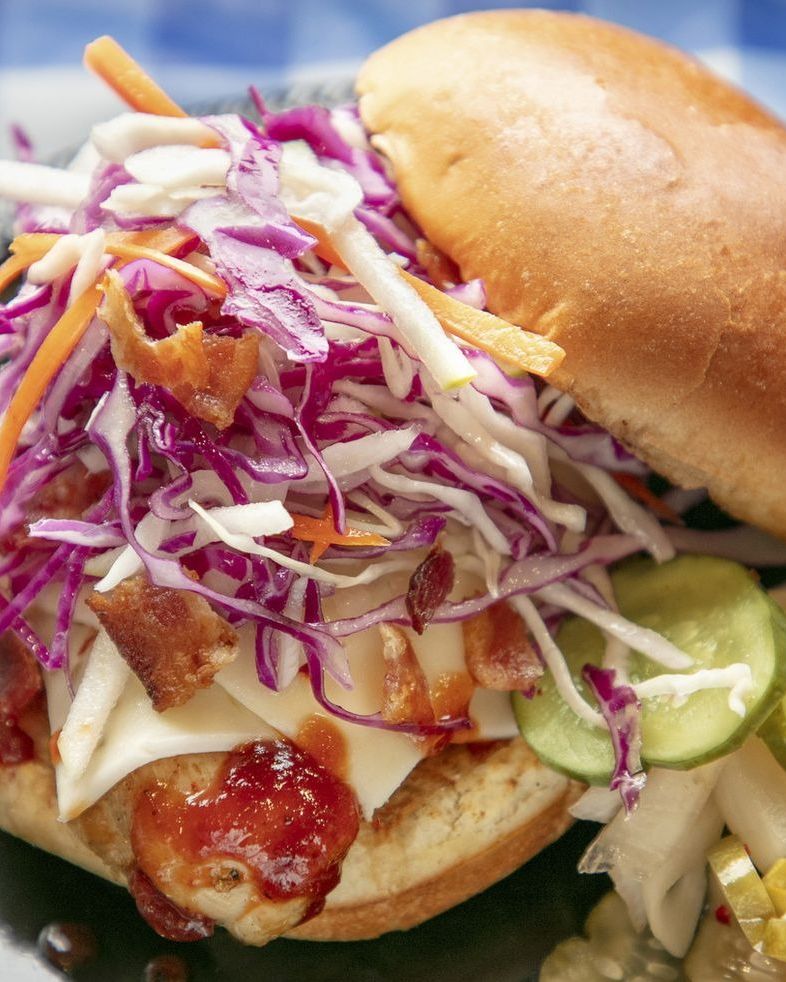 grilled chicken sandwich with slaw and pickles