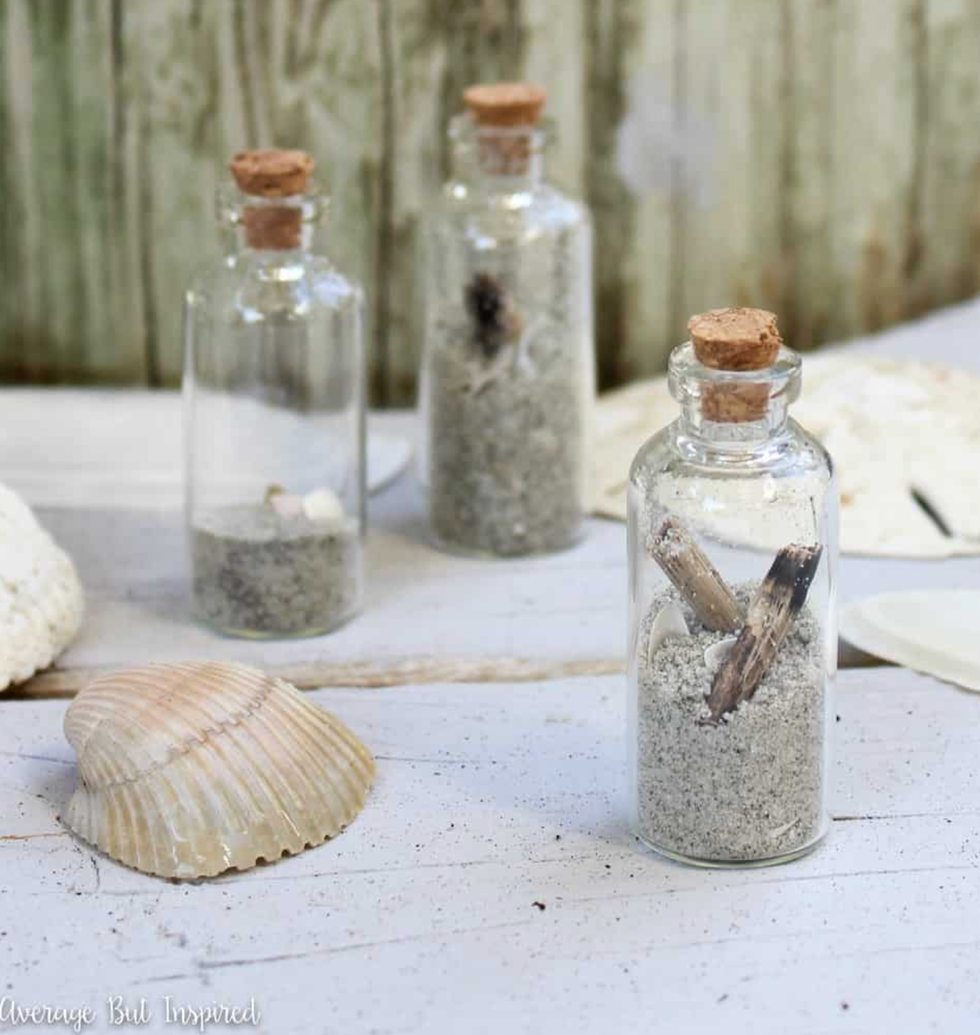 botellas decorativas con arena de playa