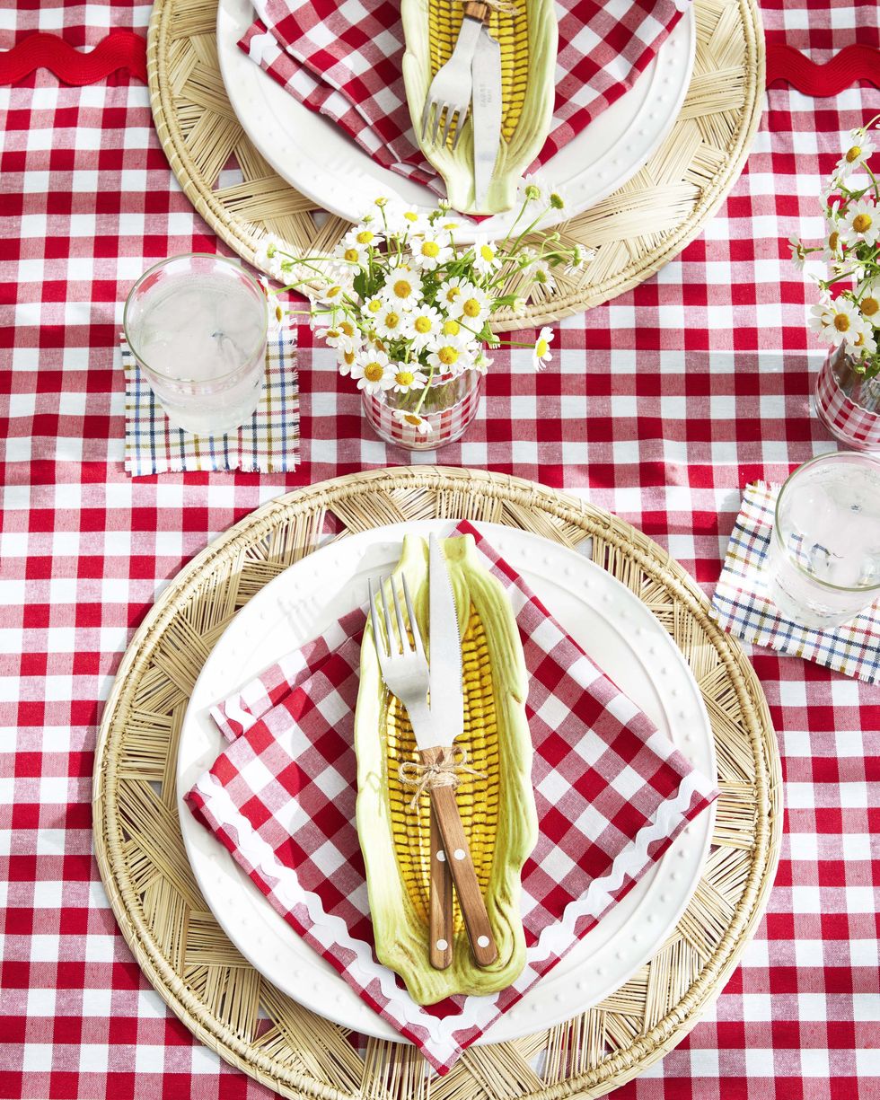 summer table set with a vintage corncob holder with servingware nestled in it