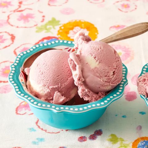 blackberry cheesecake swirl ice cream in blue bowl