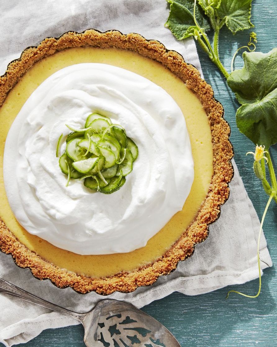 cucumber key lime pie topped with whipped cream and cucumber slices and lime zest
