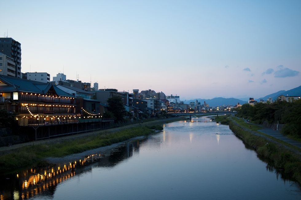 summer evening view of kamo river, kyoto city