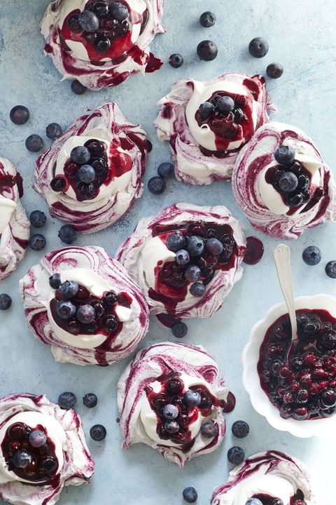 swirled meringues with blueberry sauce