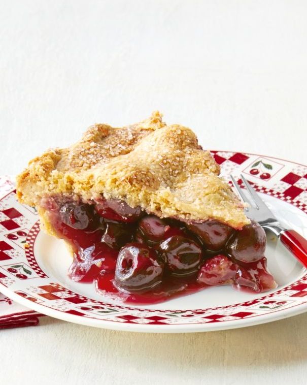 cherry pie slice with red fork