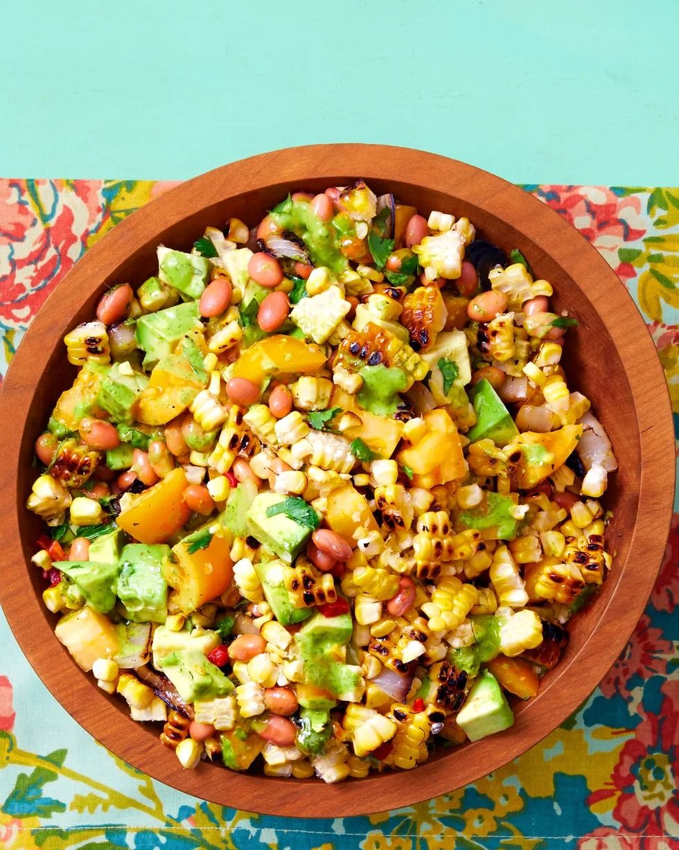 grilled corn salad with cilantro vinaigrette overhead in wood bowl