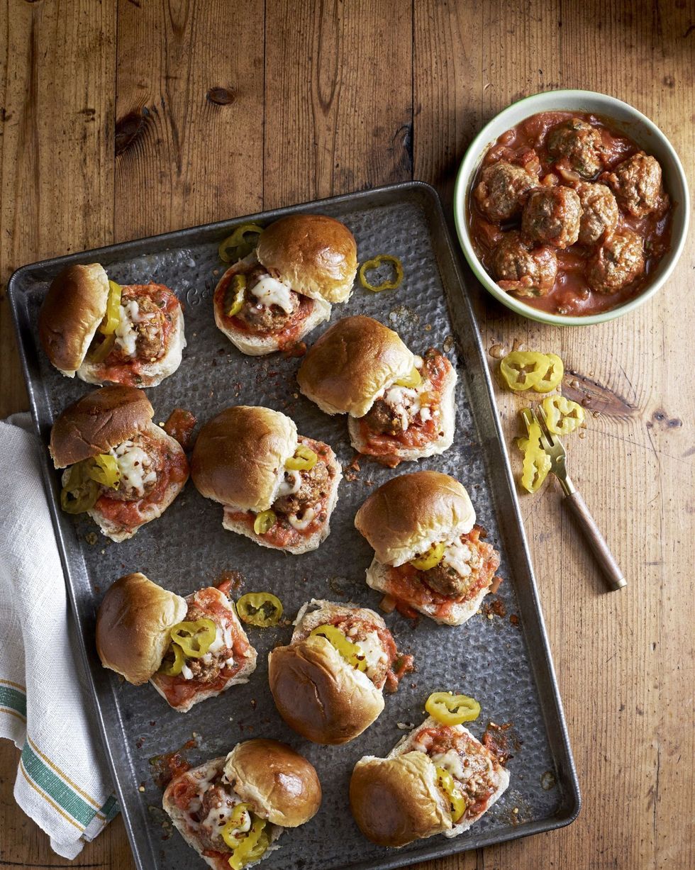 slow cooker meatball sliders on a sheet tray
