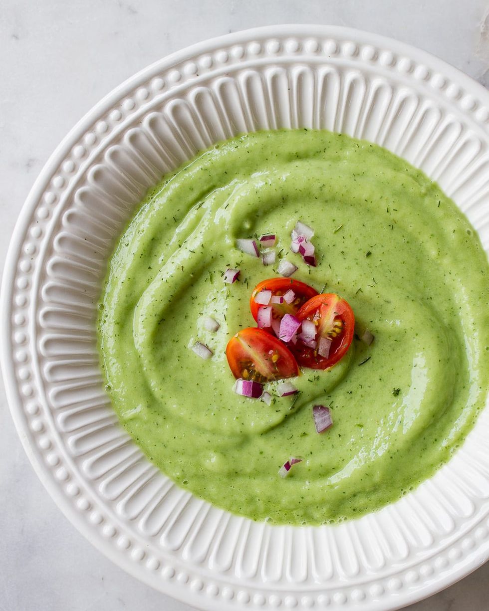 cold avocado cucumber soup with cherry tomatoes