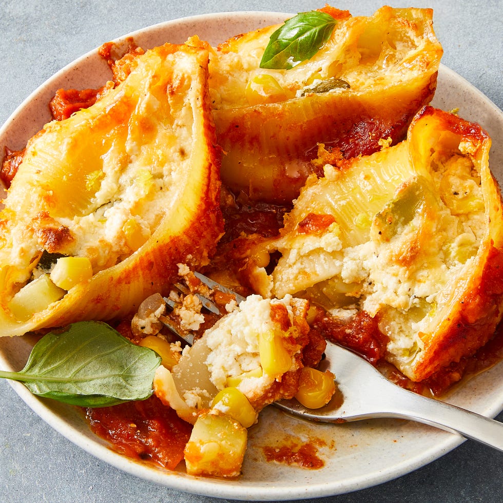 stuffed shells with sauce filled with cheese