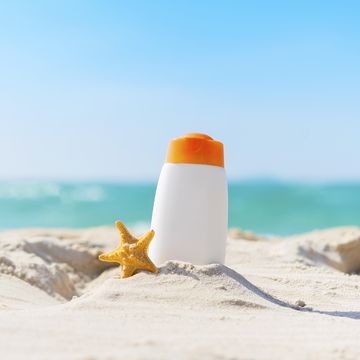 summer time on the beach with sunblock