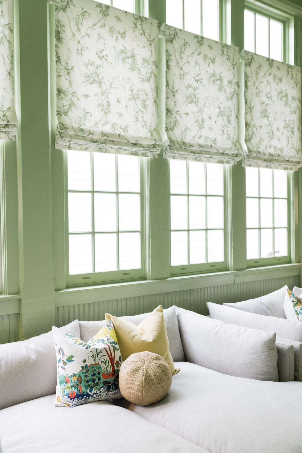 green room with floral window treatments