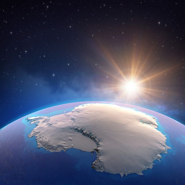 sun shining over antarctica from space