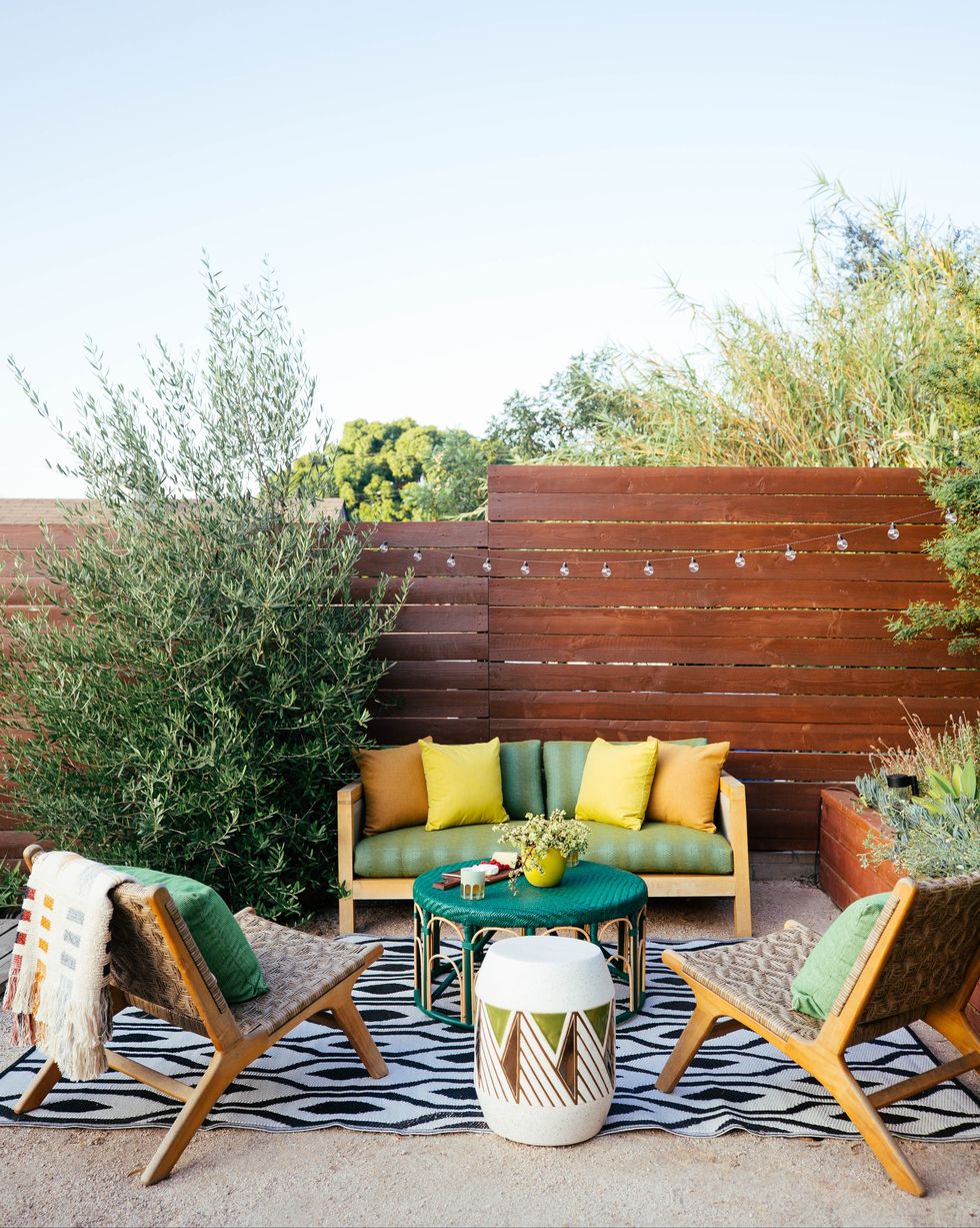 outdoor space with cozy seating designed by dabito of old brand new