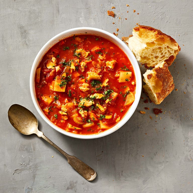 a bowl of red manhattan clam chowder