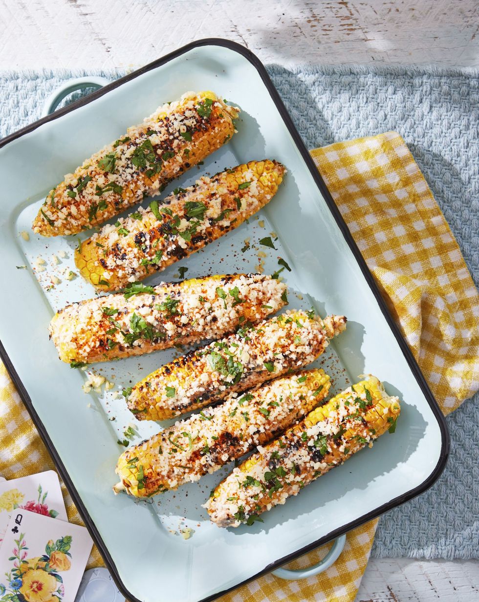 mexican street corn on a white serving tray