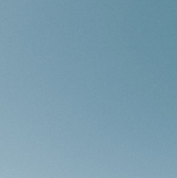 sunny blue sky above highrise cityscape, chicago, illinois, usa