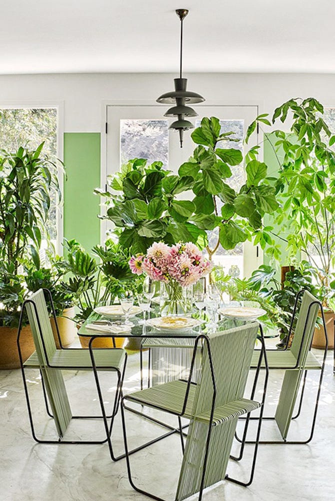 sun room with a piano