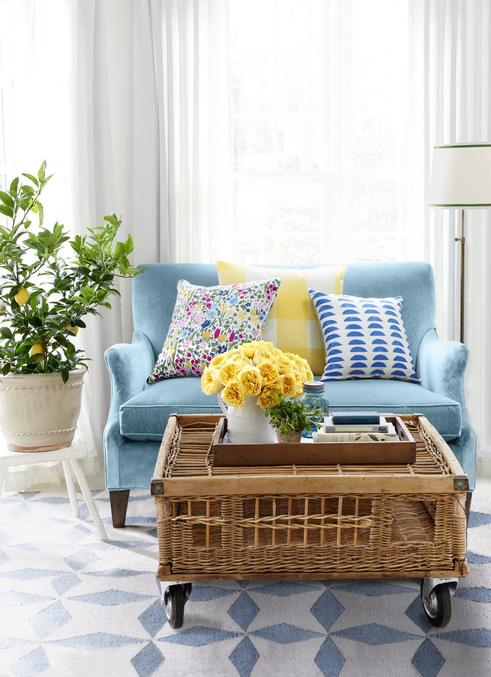 bright sunroom with wicker table