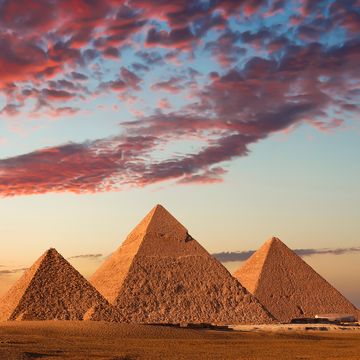 sunset at the pyramids, giza, cairo, egypt