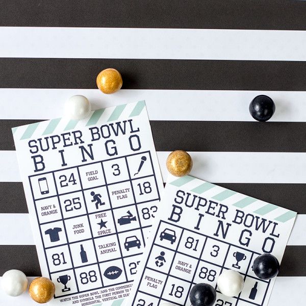 super bowl bingo cards with white gold and black bingo chips