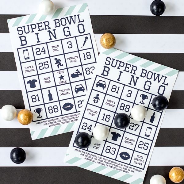 super bowl bingo cards with white gold and black bingo chips